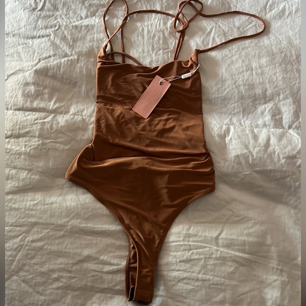 Body suit from miss Lola, never used .